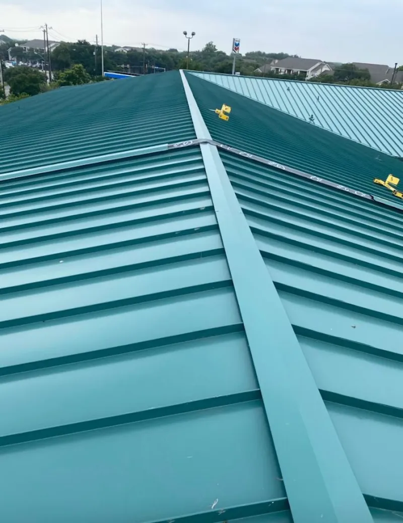 Green commercial metal roof ridge and valley for Metal Roof Repair in Trinidad